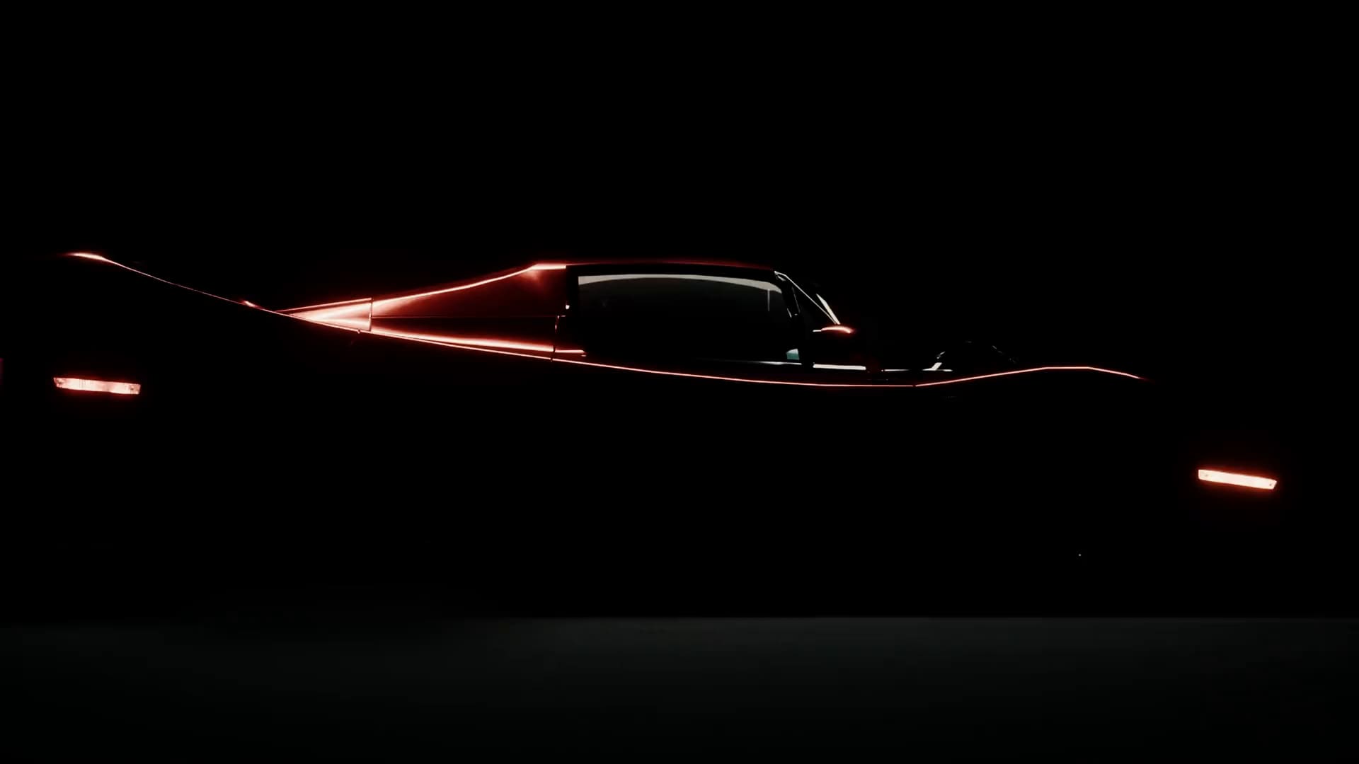 A hypercar in a black studio, its profile traced by red light